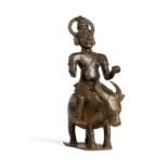 A BRONZE FIGURE OF SIVA RIDING ON NANDI, KERALA, SOUTHERN INDIA, CIRCA 18TH CENTURY