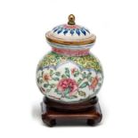 A CHINESE CANTON ENAMEL SMALL JAR AND COVER, QIANLONG PERIOD (1736-95)
