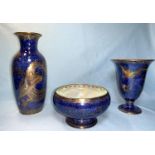 A Wedgwood mottled blue lustre vase decorated with birds of paradise; a Wedgwood mottled blue bowl