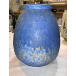 A Ruskin large ovoid stoneware vase, powder blue over pale brown glaze, 23 cm