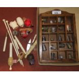 A collection of thimbles; a collection of turned and carved bone items and similar