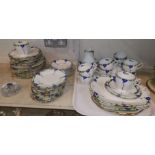 A 1930's hand painted part dinner and tea service with blue flowers by Bisto, A selection of