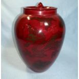 A ginger jar by Bernard Moore, flambé glazed and decorated with dragons, signed to base, height 20