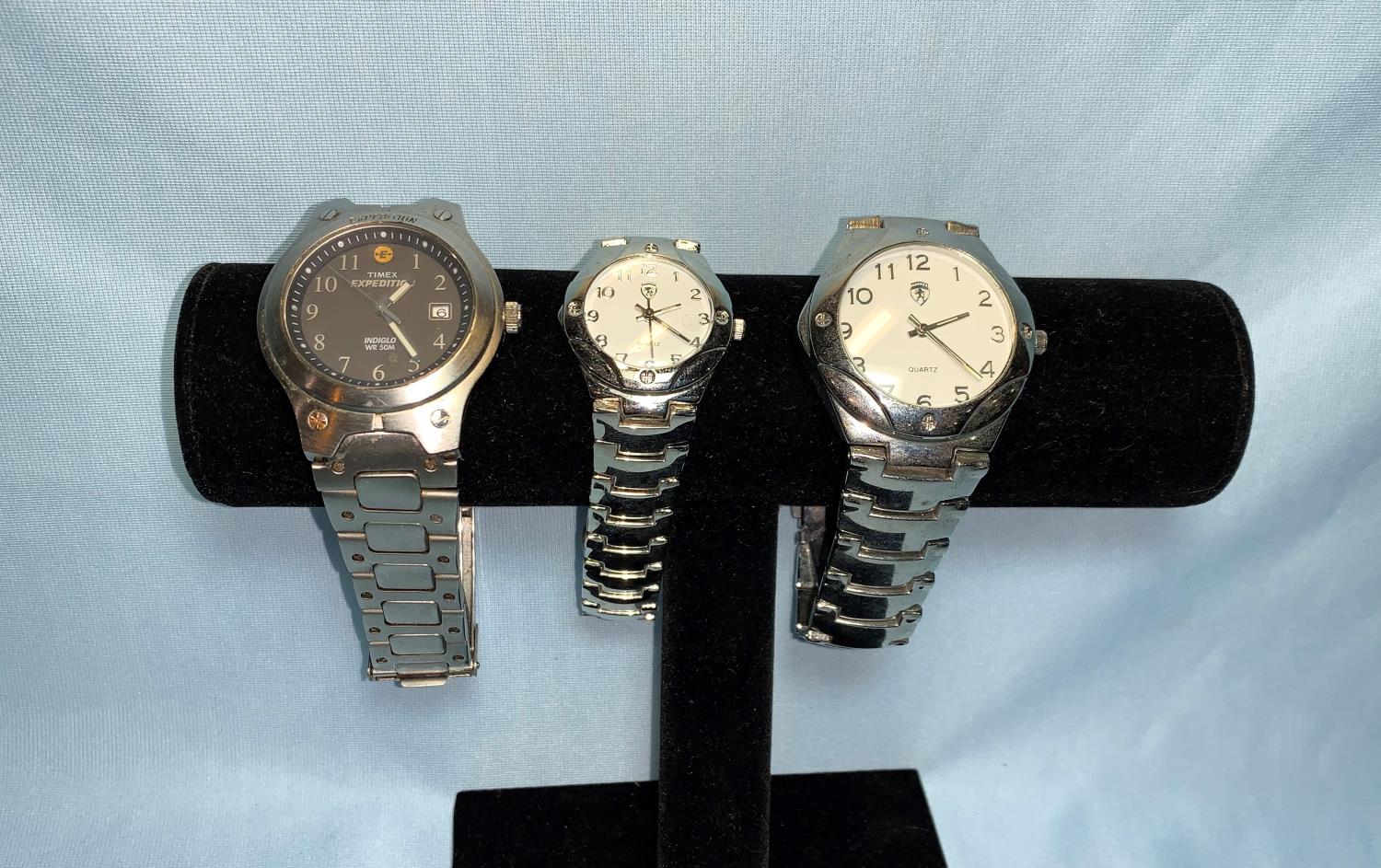 A Timex Expedition wristwatch; 2 similar watches