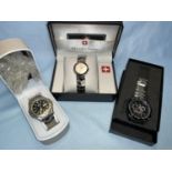 A cased quartz wristwatch by Montre Suisse; another sports watch by Lorus; another