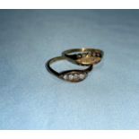 An 18 carat gold ring set 5 old cut diamonds; another similar ring, 4.4 gm gross