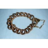 A 9 carat gold chain bracelet with padlock clasp, 34 gm