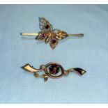 A 9 carat gold bar brooch with stone set butterfly; another set garnet and seed pearls (both pins