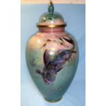 Walter Slater for Shelley: a covered lustre vase decorated with carp against a shaded turquoise