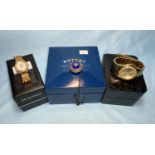 A Cosmopolitan pearlescent face lady's gilt quartz watch, boxed and another