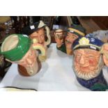 Four large Royal Doulton large character jugs: Sir Francis Drake; The Collector, signed by Kevin