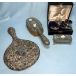 A white metal hairbrush and hand mirror set; a hairpin dish; an egg and spoon christening set; a