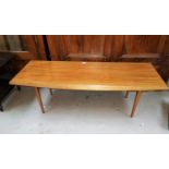 A Gordon Russell teak coffee table with shaped top