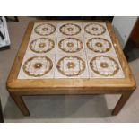 A 1960's G-Plan 2 tier rectangular coffee table; a tile top coffee table