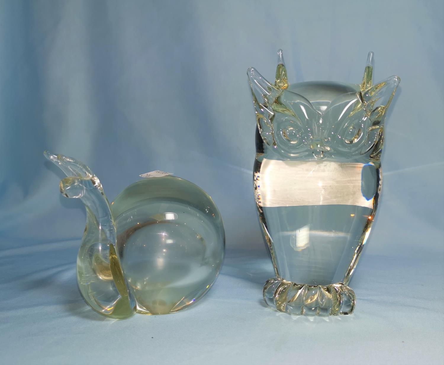 A glass owl sculpture signed G Rudeco; a similar snail