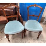 A Victorian set of 4 mahogany dining chairs, blue upholstery
