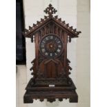A late 19th century Black Forest mantel clock with Bugle Boy alarm, 65 cm
