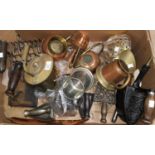 A selection of old irons, including a gas and charcoal example; trivets; metalware; vintage tins