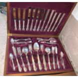 A silver plated canteen of kings pattern cutlery for 8, in walnut case