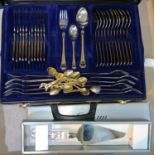 An Amefa deluxe canteen of cutlery, stainless steel and gilt, in fitted attaché case