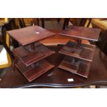 A pair of reproduction mahogany table top revolving book cases
