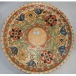 A large Crown Ducal Charlotte Rhead charger , Mexican Flower pattern, numbered 6184 to the back,