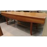 A large modern wakes style table in cherrywood, with shaped drop edges, length 238 cm, extended