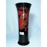 A Moorcroft pottery pomegranate vase of cylindrical form with everted rim, 32 cm