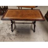 A reproduction nest of 3 occasional tables; a similar coffee table