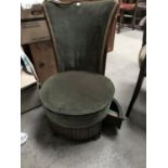 A mid 20th century side chair in green, with base drawers