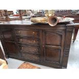 An oak Priory style sideboard