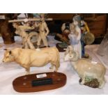 A Beswick Charolais bull; a Nao girl; a similar ram