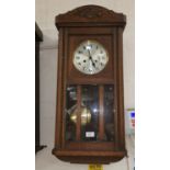 A George V 8 day chiming wall clock in oak case; another similar