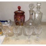 A Mary Gregory style cranberry covered vase; 2 whisky decanters; part suite of cut crystal