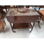 A mid 20th century mahogany sewing trolley