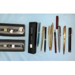 A collection of propelling pencils and ballpoint pens by Waterman, Dupont, Parker, etc.; 3