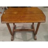 A oak arts and crafts coffee table with U shaped support