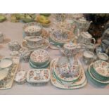 A Minton "Haddon Hall" part dinner service approx 65 pieces including two tea pots and a coffee