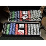 Two metal cased sets of 'casino' chips and a green baize table cover for Poker /
