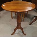 A Victorian mahogany occasional table with pedestal base and oval top