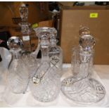 A cut claret jug; crystal decanters; 2 glass and silver plate pie slices