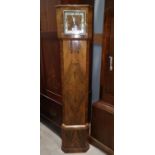 An Art Deco walnut granddaughter clock with chiming movement, by Enfield