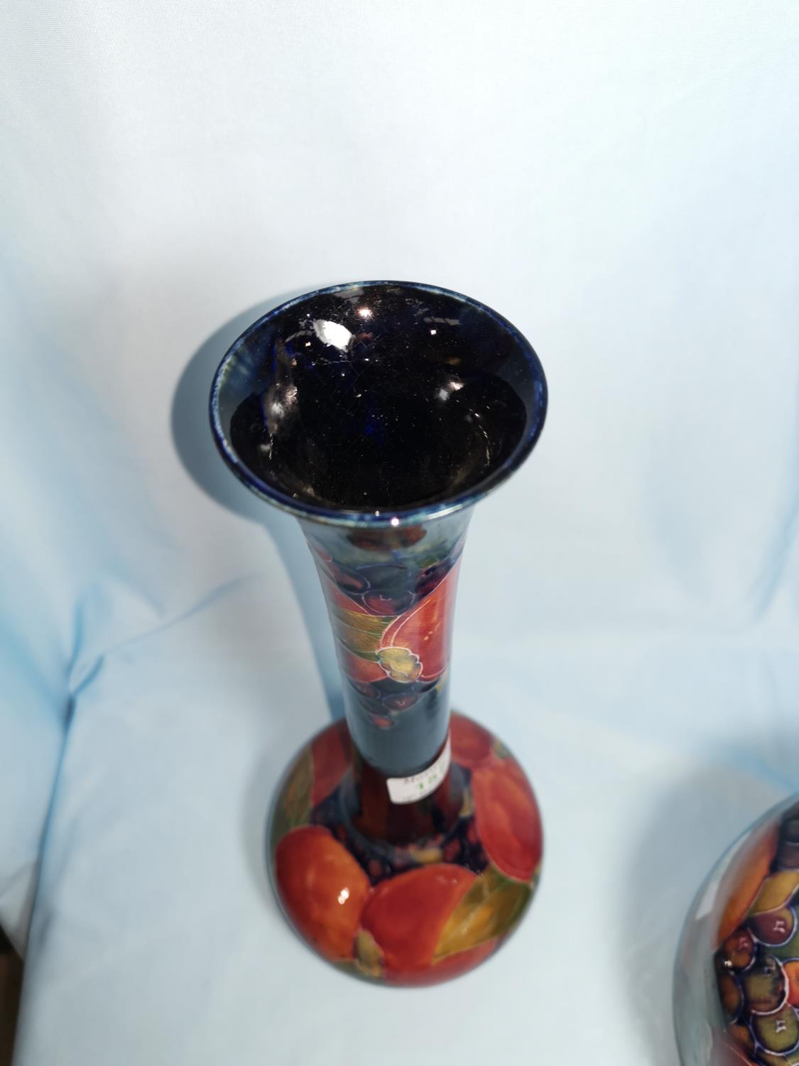 A Moorcroft pottery pomegranate vase of bulbous form with tall neck with everted rim, 33 cm - Image 2 of 3