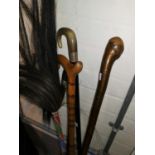 A horn handle walking stick with silver mount; others; a fly whisk