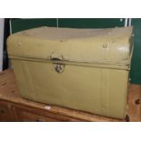 A large yellow tin trunk