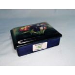 A Moorcroft rectangular covered box decorated with flowers, 12.5 cm