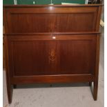 An Edwardian pair of inlaid mahogany double bed ends and irons