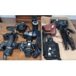 2 SLR cameras - Minolta and Pentax; other cameras and lenses