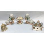 A Victorian pair of china poodles with baskets of puppies; 2 encrusted ornaments; a Nao figure and 2