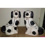 A pair of Staffordshire style dogs, vases